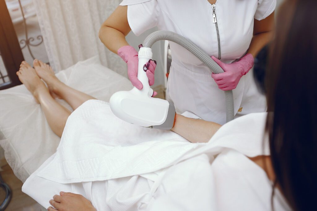 A woman getting laser hair removal in arms in NJ